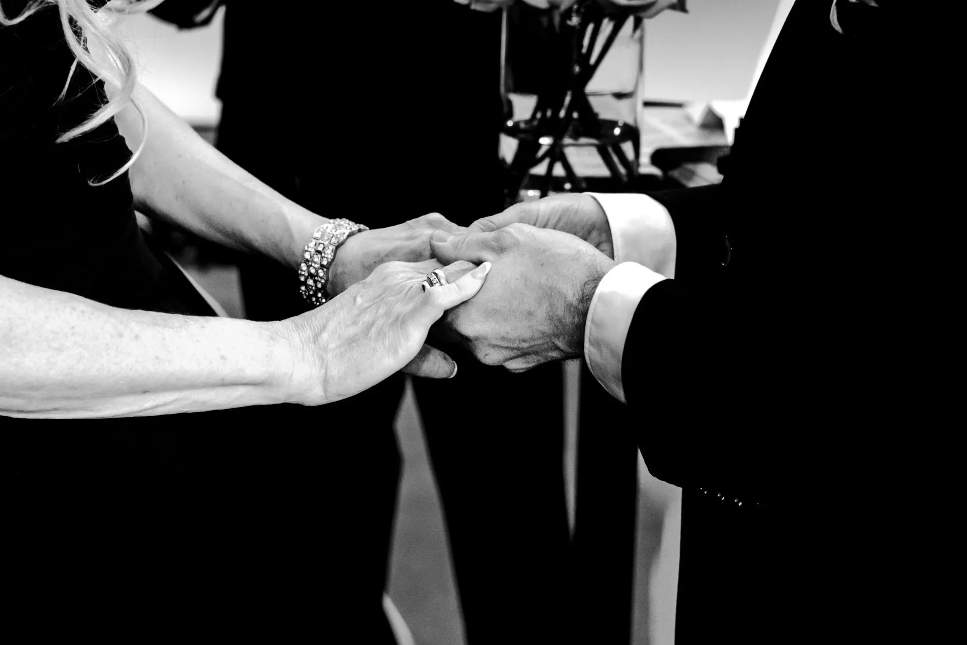 Close-up of bride’s hands holding bouquet – romantic wedding photo detail